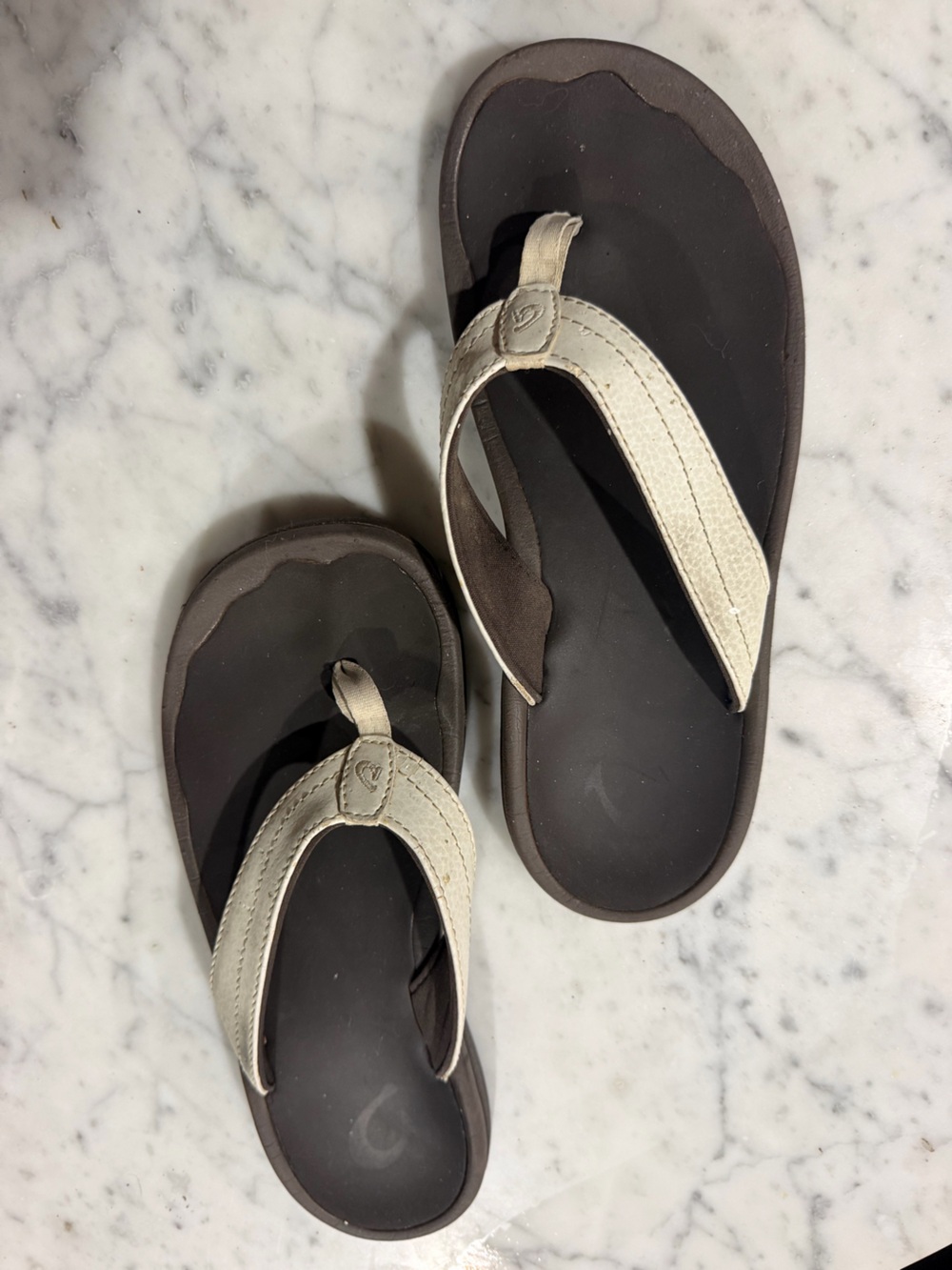 OluKai  Dark Brown Flip Flops with Cream Straps Size 8
